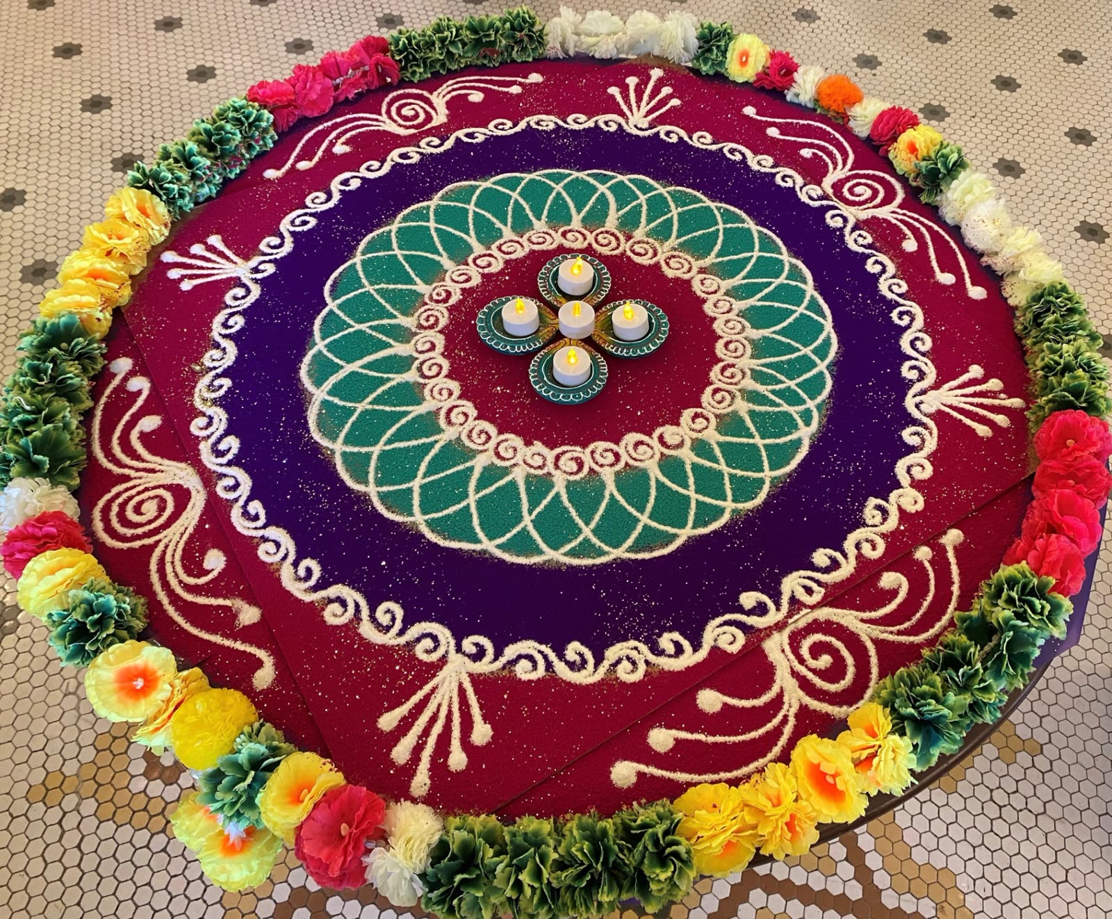 Floral Mandala Rangoli with Candles and Flower Garlands